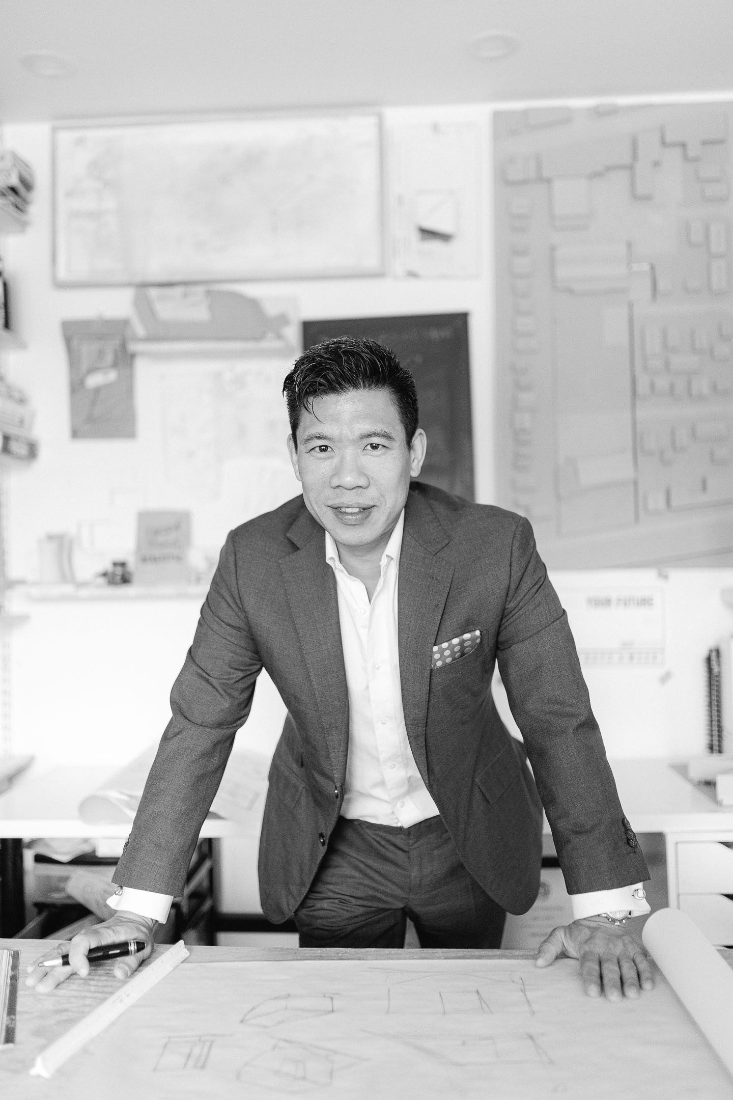 Profile photo of Jay Lim standing behind a desk