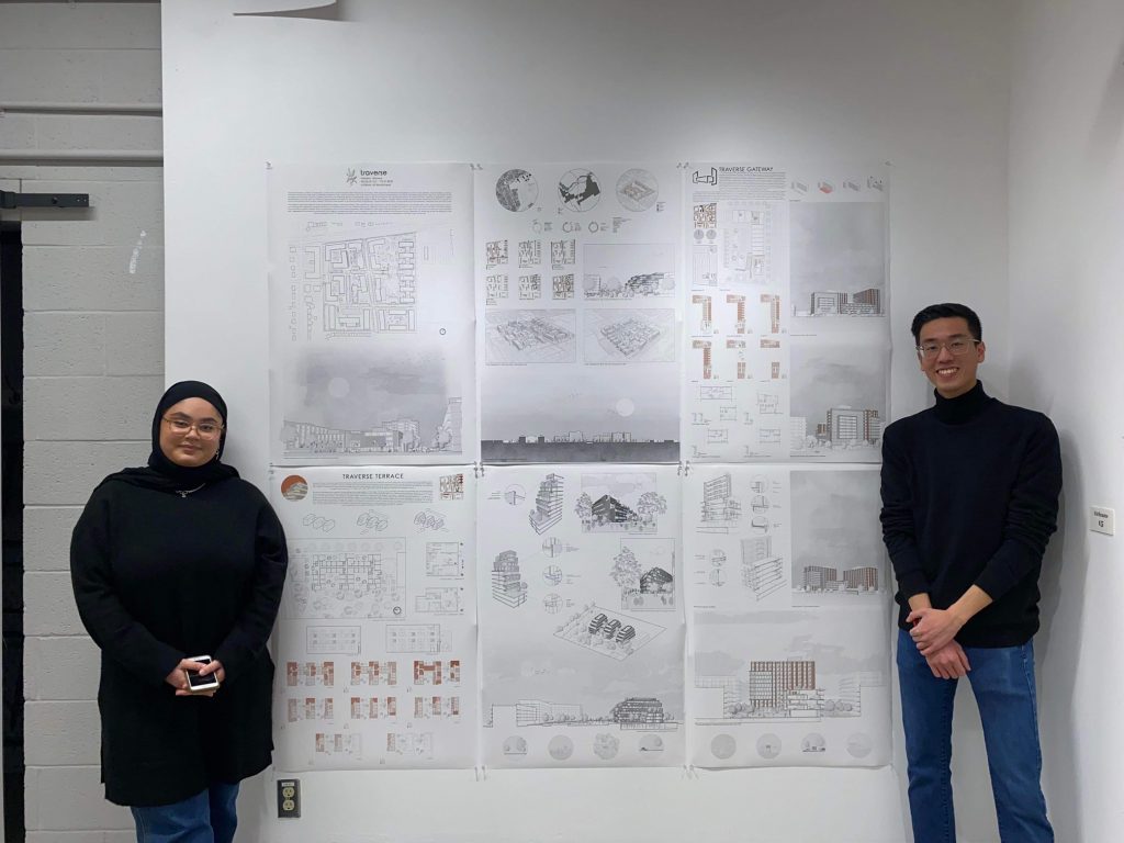 First Prize winners Sideqa Haqani (L) and Justin Li (R) pose with their panels.