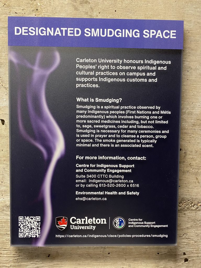 sign that says dedicated smudging space