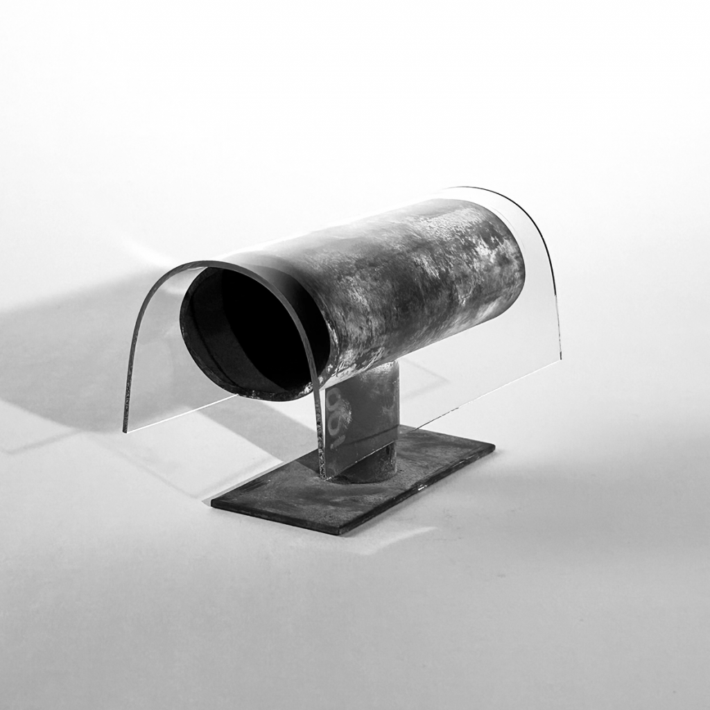 bent glass forming an arch on top of a cylindrical metal base