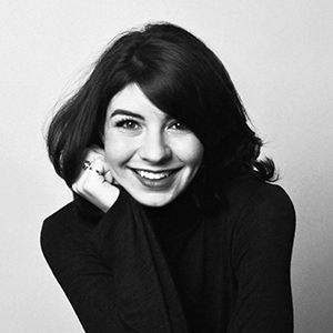 Black and White headshot of Asst. Prof. Piper Bernbaum.