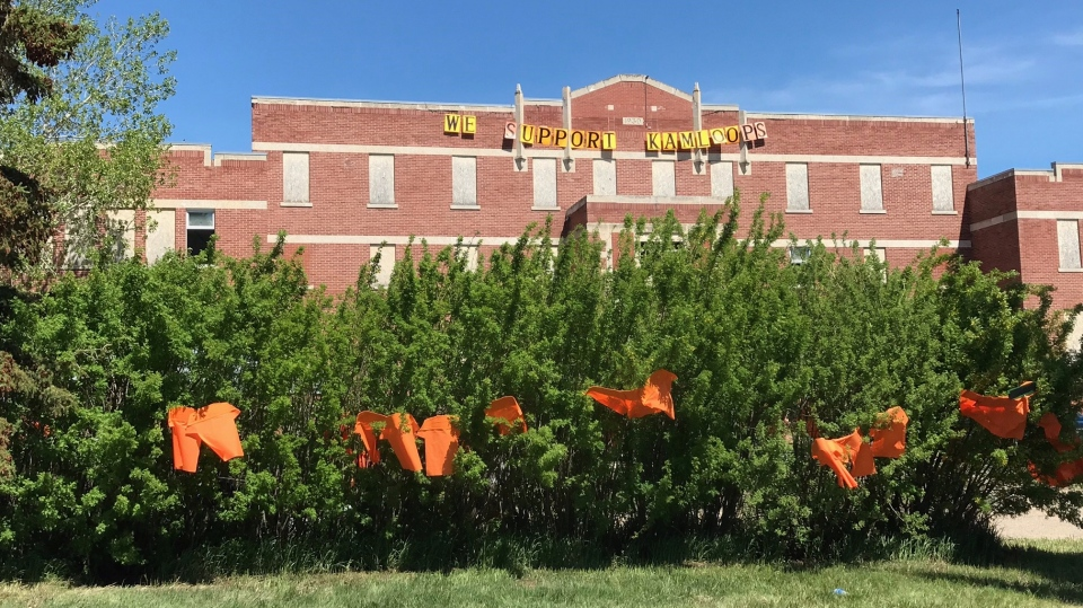 Photo of the Muscowequan Indian Residential School with the words 