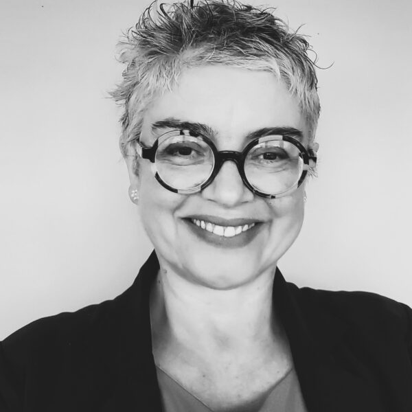 Black and white headshot of Adriana Ross