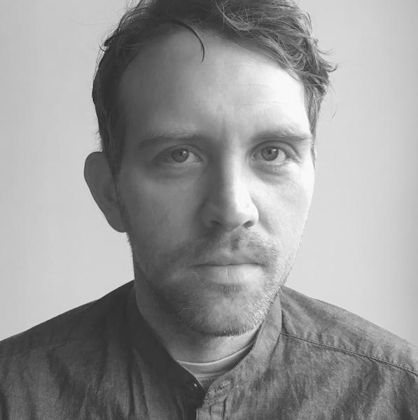 Black and white headshot of Christopher Alton