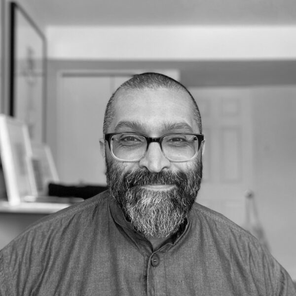 Black and white headshot of Ozayr Saloojee