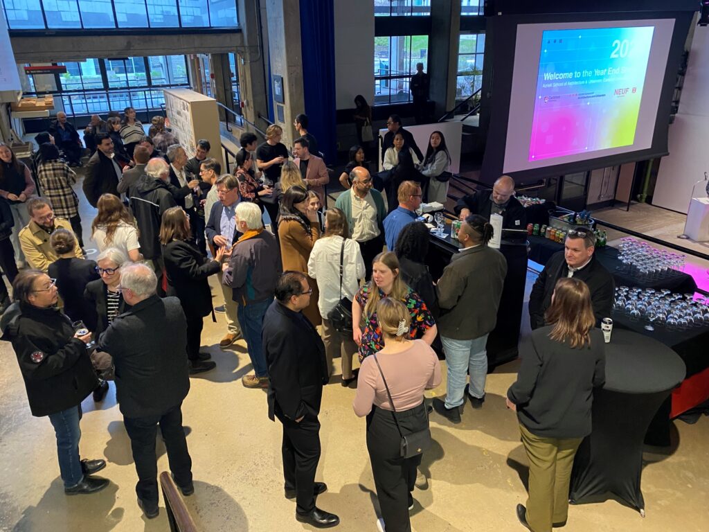 Group of individuals attending the Year End Show