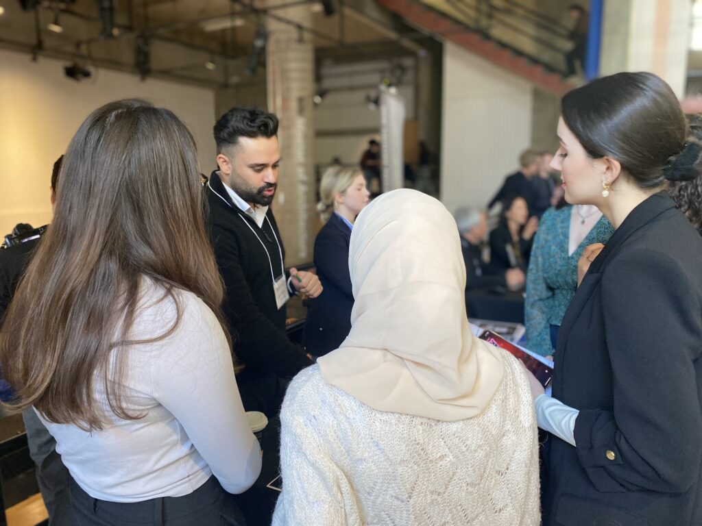 Employer speaking with a group of students