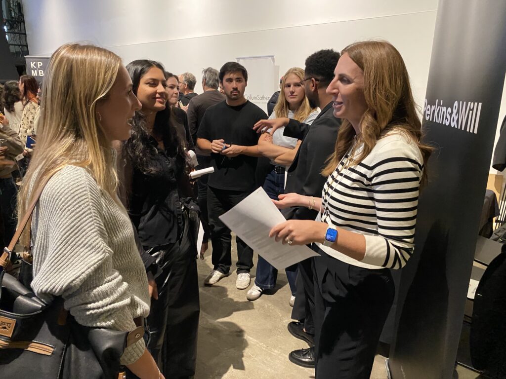 Cody Wainstock speaking to students at Perkins&Will booth