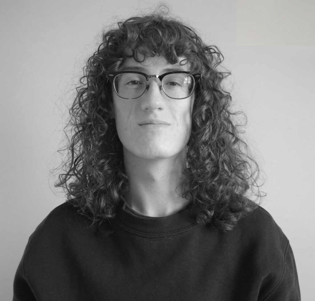 Black and white headshot of dylan jozkow