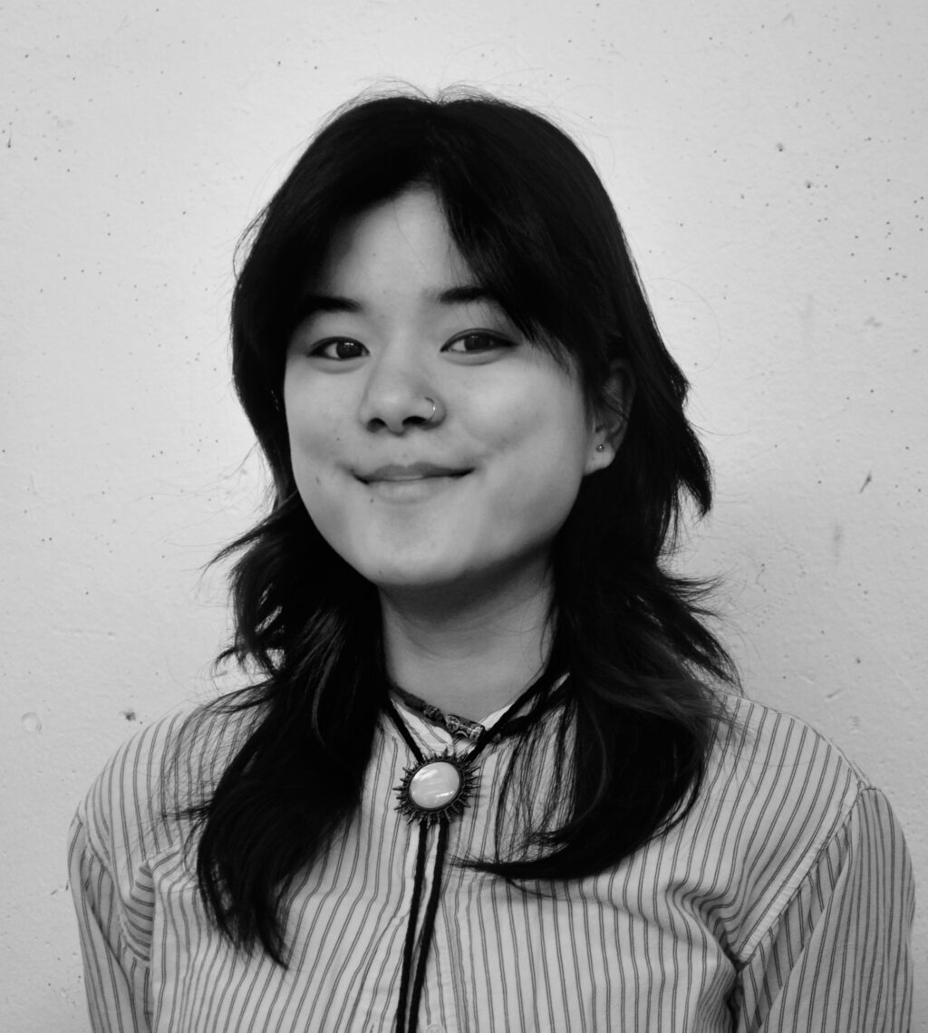 Black and white headshot of Mia Wong