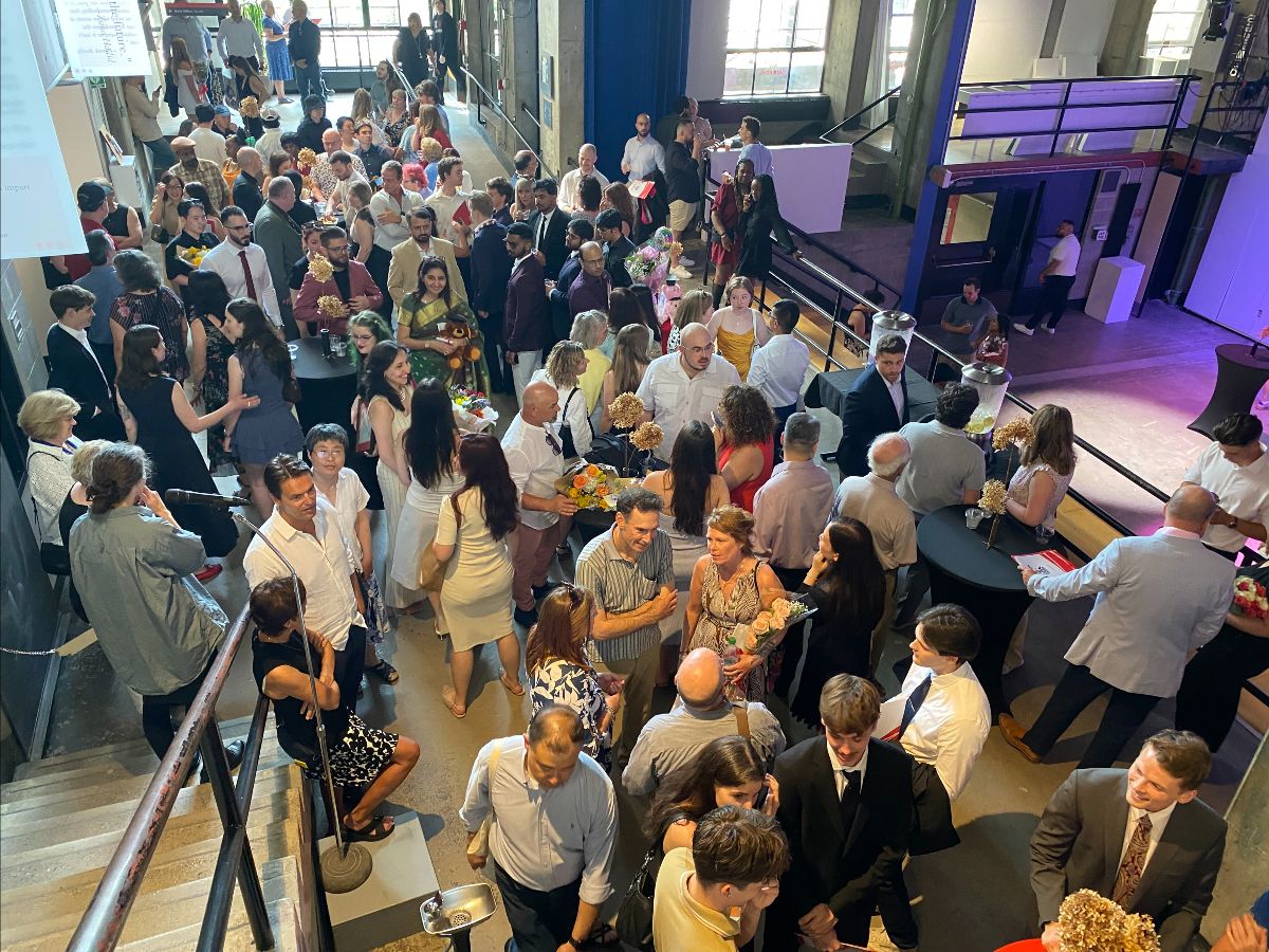 people gathered in the pit for the 2025 convocation reception