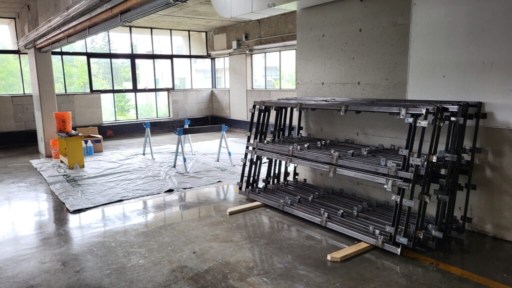 second year studio empty with the table hardware ready for assembly.