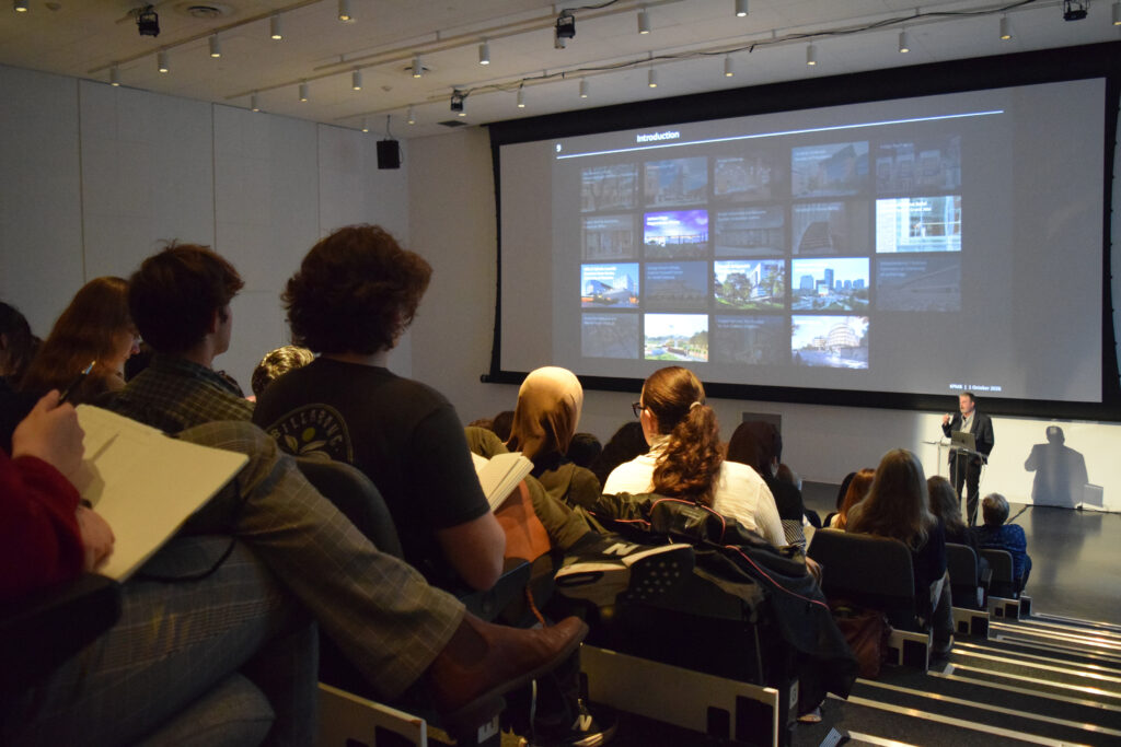 view of the lecture from the back of the room