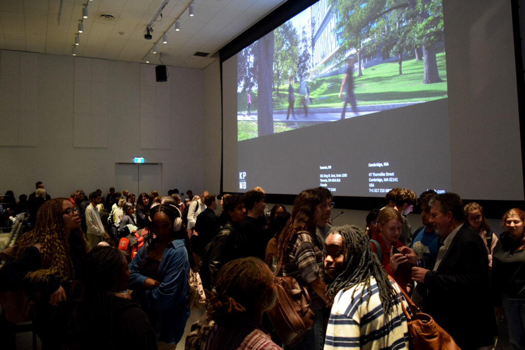 After the lecture, students approached Mitchell Hall with questions