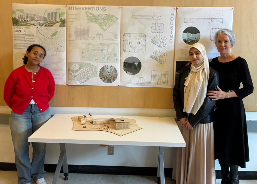 Instructor Lyette Fortin with two students during final review